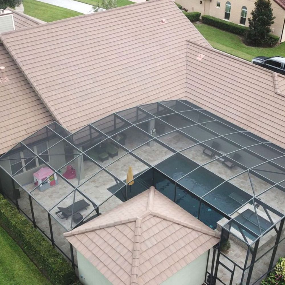 Low pressure cleaning and careful brushing of the surface leaves your screen enclosure looking like a window when we’re done